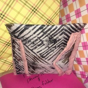 Women's hand clutch & makeup case